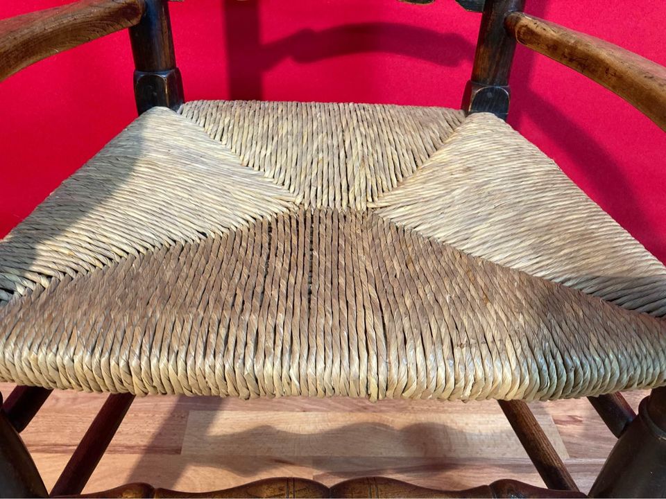 Antique Georgian Period Elm Ladderback Fireside Armchair with Rush Seat, c.1800.